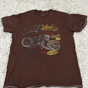 Brown never worn T-shirt. Good condition.